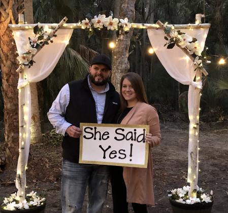 Brandon Stiffey and Megan Priske Just engaged.  High school sweethearts and he recently proposed on the property that they will be building their home on.