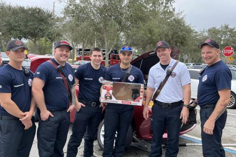 Oviedo firefighters saved a kitten (below) from the wheelwell of a car (above).
