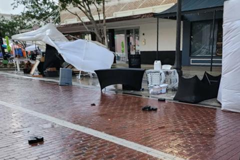 On Sunday morning, 1st Street was hit with a major storm causing artwork from the St. Johns River Festival of the Arts to blow everywhere.