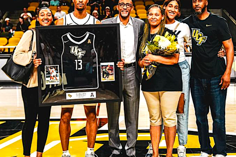 Photo courtesy of Conor Kvatek/UCFAA _ Coach Johnny Dawkins and the UCF Men’s Basketball Program honored senior C.J. Kelly and his family prior to Sunday’s contest with ECU.