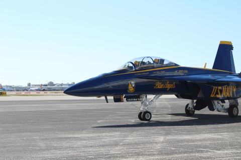 Blue Angel No. 7 Lieutenant Connor O’Donnell (left) and Blue Angel No. 8 Lieutenant Commander Brian Vaught taxi on the runway at the Orlando Sanford International Airport after their arrival this Tuesday