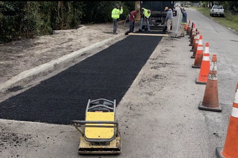 The damaged roadway was milled, then hot asphalt was added to create an asphalt patch of road, completing the repair project. 