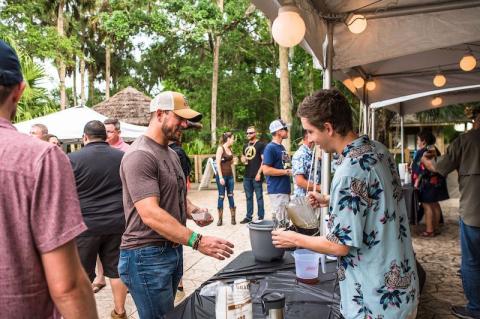 Guests can try different beers at the Brews Around the Zoo event.