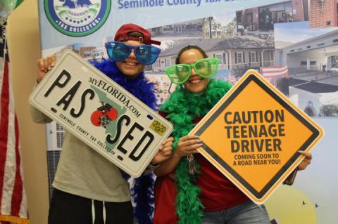 Isaiah, a resident of Seminole County, celebrated his new driver's license with some photos at the Casselberry branch's new photo booth Monday.
