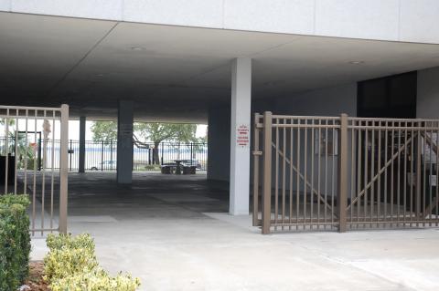 Newly erected gates will block the additional entrance on the west side of City Hall. 