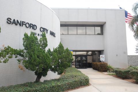 Sanford City Commissioners voted to place a police officer in the lobby of City Hall. 
