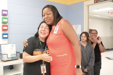Seminole High School 9th Grade Teacher Eva Velez (left) hugs Seminole High School 9th Grade Center Principal Jaime Washington during her classroom reveal earlier this week. 