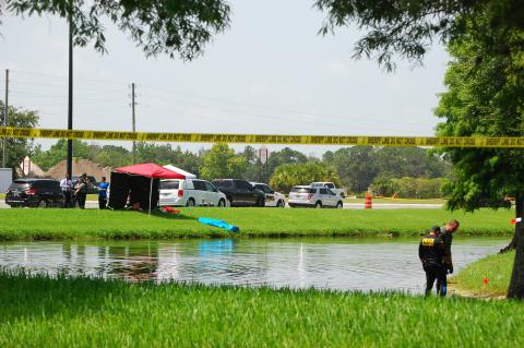 Teams from the Seminole County Sheriff's Office work to investigate the scene. 