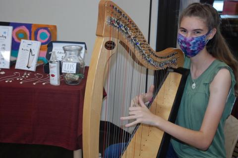 Abi Joy’s sister, Lydia Grace, also had a booth to sell handmade jewelry. An avid harp player, Lydia's goal was to make enough money to buy the “harp of her dreams."