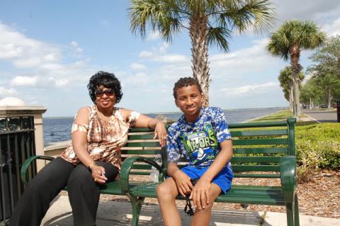Janice London and her grandson Jonah enjoy the sun along the RiverWalk Wednesday afternoon. Jonah is a fifth-grader at Goldsboro Elementary.