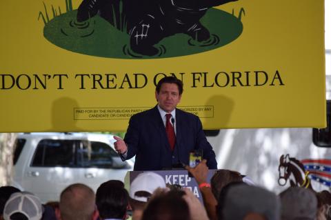 Florida Governor Ron DeSantis speaks to the crowd at Horsepower Ranch in Geneva on Wednesday for the Keep Florida Free Tour.