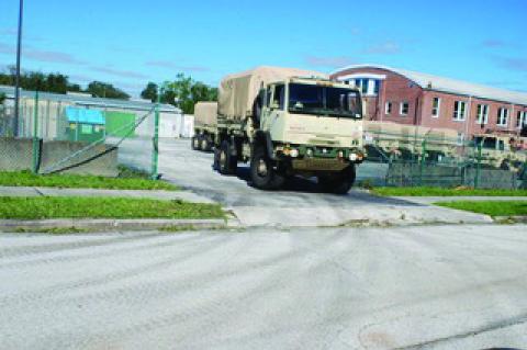 The National Guard heads out of downtown Sanford. 