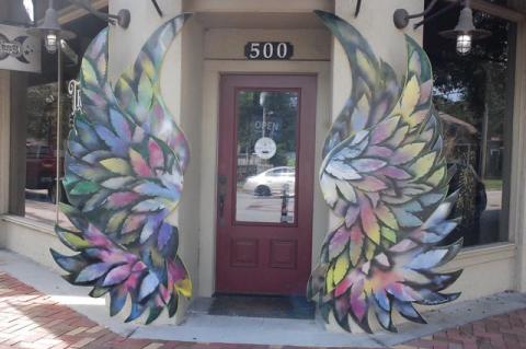 Wings in front of 500 Sanford Ave., Triple Goddess Treasures