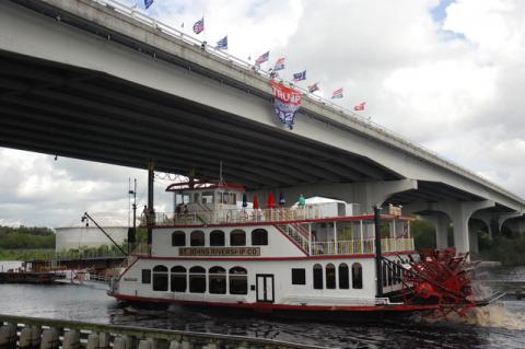 The Barabard Lee passes under U.S. 17-92, where flags and and boats were there in support.