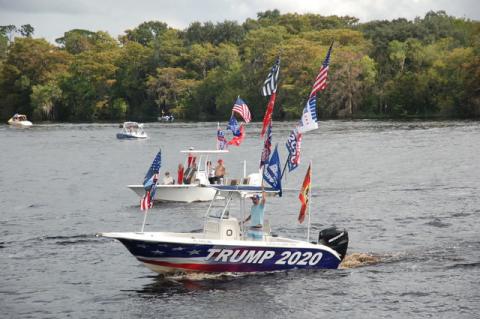 Boats with flags and decorations headed down the St. Johns to show their support of Pres. Trump.