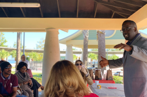 Fedrick C. Ingram, president of the Florida Education Association, speaks to a Seminole County audience in Fort Mellon Park recently about the need to increase public education funding in Florida.