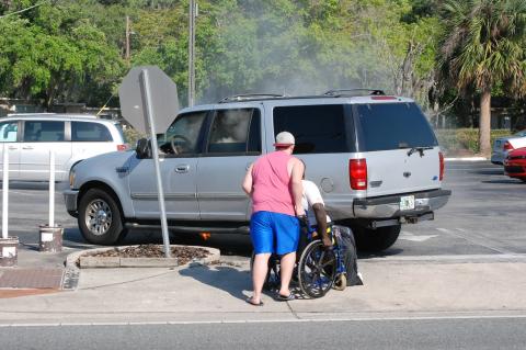 Just as flames were appearing under the SUV patrons were able to get James Jackson into his wheel chair and away from the fire. 