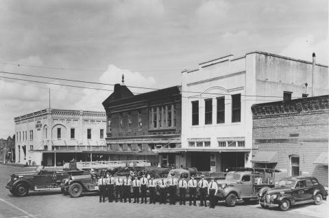 The Sanford Fire Department is pictured some time in the early 1940s in front of the then-station on Palmetto Avenue in downtown Sanford. The former fire station, still standing, now houses The Station Bar & Grub.