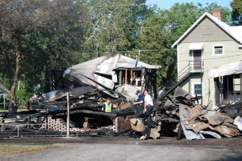A fire ripped through houses in the area of Oak Avenue and 4th Street early Tuesday morning.