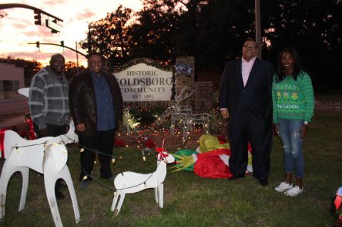 Pastors Sammie J. Edwards (from left), Cubit Malone and Tyler M. Anderson Sr., along with former 2018 mayoral candidate Pasha Baker, came out to celebrate Light Up Goldsboro on Friday.