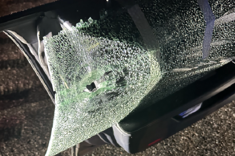 A photo of the Mercedes’ window shows the bullet hole from the road-rage incident on I-4.