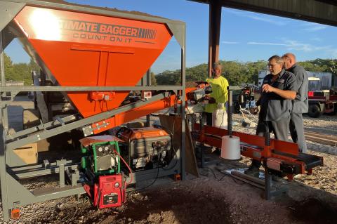 The new sandbag-filling machine (above) will help save time and labor for Oviedo residents before a storm.