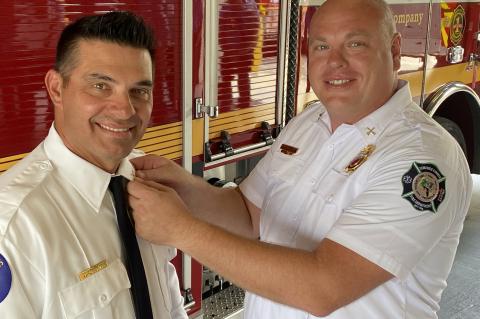 Moore (left) with his mentor Battalion Chief Bryon Chaney.