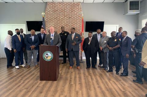Pictured above are Secretary Eric Hall, Florida Department of Juvenile Justice, Senior Chancellor Henry Mack, Florida Department of Education, Art Woodruff, City of Sanford Mayor, Kerry S. Wiggins, Sr., City of Sanford Commissioner, Norton Bonaparte, Jr., Sanford City Manager, Cecil Smith, Sanford Police Chief, State Representative David Smith, and Glenton Gilzean Jr., President and CEO of the Central Florida Urban League.