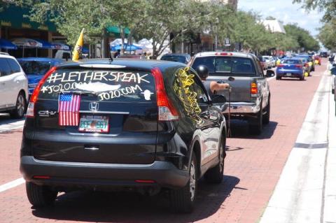 Decorated cars rolled through downtown Sanford in support of the Libertarian party and its presidential nominee.