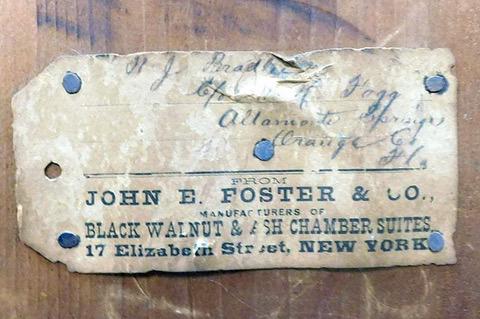 A tag on the piece of furniture (above) shows that it used to belong to Nathaniel Bradlee.