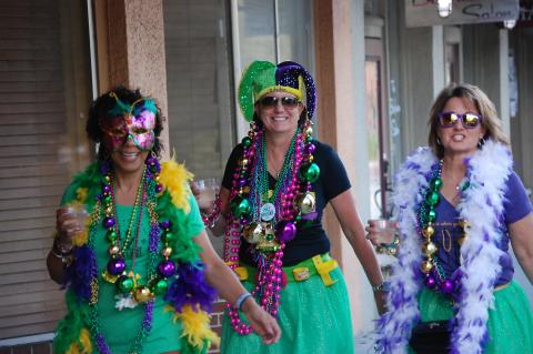 Attendees at the Mardi Gras sashay are encouraged to dress up for the street party.