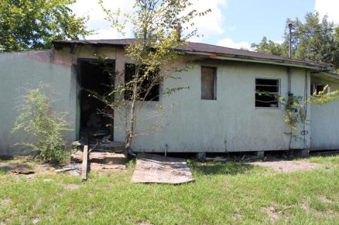 The house at 1605 Merthie Drive will have a grace period for the owners to fix it up, the City Commission ruled Monday.