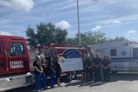 US Congresswoman Stephanie Murphy with Dr. Georgia L. Lorenz, President of Seminole State College, and Seminole State College Public Safety staff and students.
