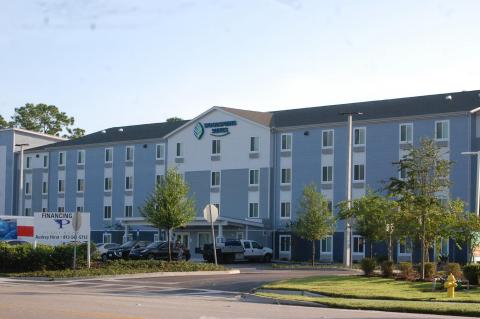 The WoodSpring Suites Hotel (above) near the Seminole Towne Center will be the 23rd WoodSprings Hotel in the United States. 