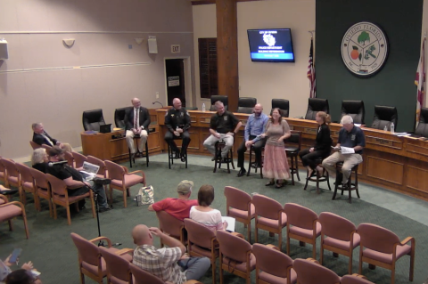 The Oviedo City Manager, Police Chief and City Council address residents at Thursday’s meeting.