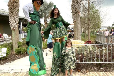 Like last year, this year’s St. Patrick’s Day Festival will feature live entertainment including stiltwalkers (above) face painting, a photo booth, jugglers and green beer.