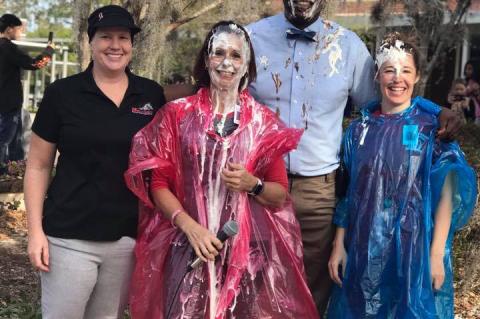 Three instructors at Markham Woods Middle School got pies to the face as part of a donation fundraiser for beloved teacher Jeni Meriwether, currently fighting cancer.
