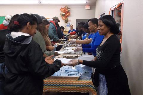 Rescue Outreach Mission Staff & Volunteers serving meals.