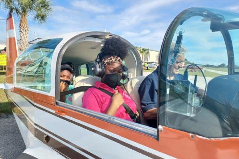 Fifteen young women from the Glorious Hands organization in Sanford journeyed to the Orlando Apopka Airport Saturday to take their first flight on a small aircraft. The 15- to 20-minute flights introduced the girls to aviation (above, below).