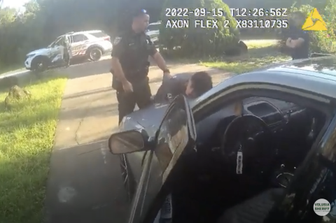 Body camera footage shows the moment 18-year-old Bryan Holmes was apprehended by Volusia County deputies. 