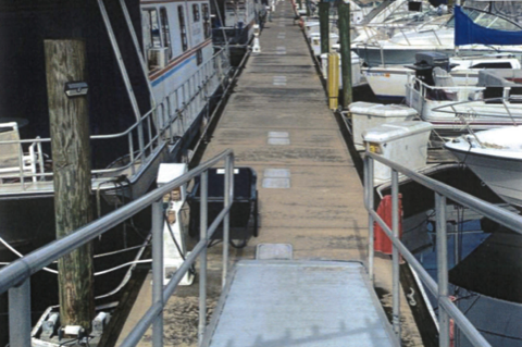 In an assessment of the conditions of the Sanford Marina, problems such as a tilited main pier (above) were noted.