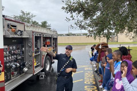 A Seminole County Firefighter shows the engine to a group of students during last week’s Teach-In.