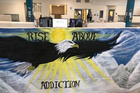 A colorful mural in the men’s O-Pod of the John E. Polk Correctional Facility serves as a reminder to those in recovery. 