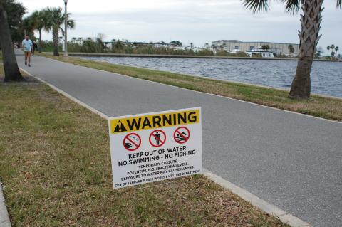 The City of Sanford placed signs along the waterfront this week warning about possible contamination in Lake Monroe. 
