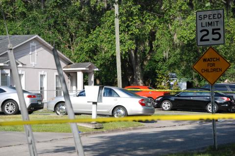Police worked the scene on Thursday where the shooting occurred on W. 11th Street.