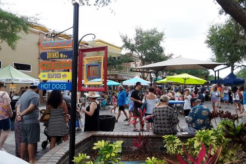 Guests gather in Magnolia Square during last year’s St. Johns Festival of the Arts.