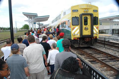 People wait to get the first glimpse of the SunRail train during an open house event five years when the train debuted. 