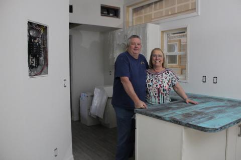 Brett and Kim Hiltbrand of Cornerstone Tiny Homes in one of the tiny homes soon to be sold, as the City of Longwood has recently allowed communities of them to be built.