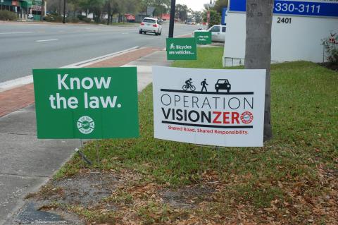 Signs along 25th Street and French Avenue warn drivers, bicyclists and pedestrians of the laws regulating the traffic rules. 