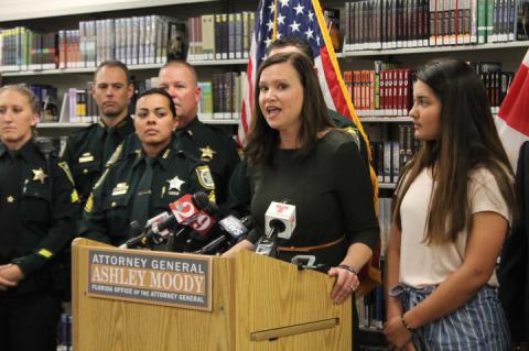 Attorney General Ashley Moody appeared at Oviedo High School Wednesday to talk about her office's new investigation of e-cigarette companies.